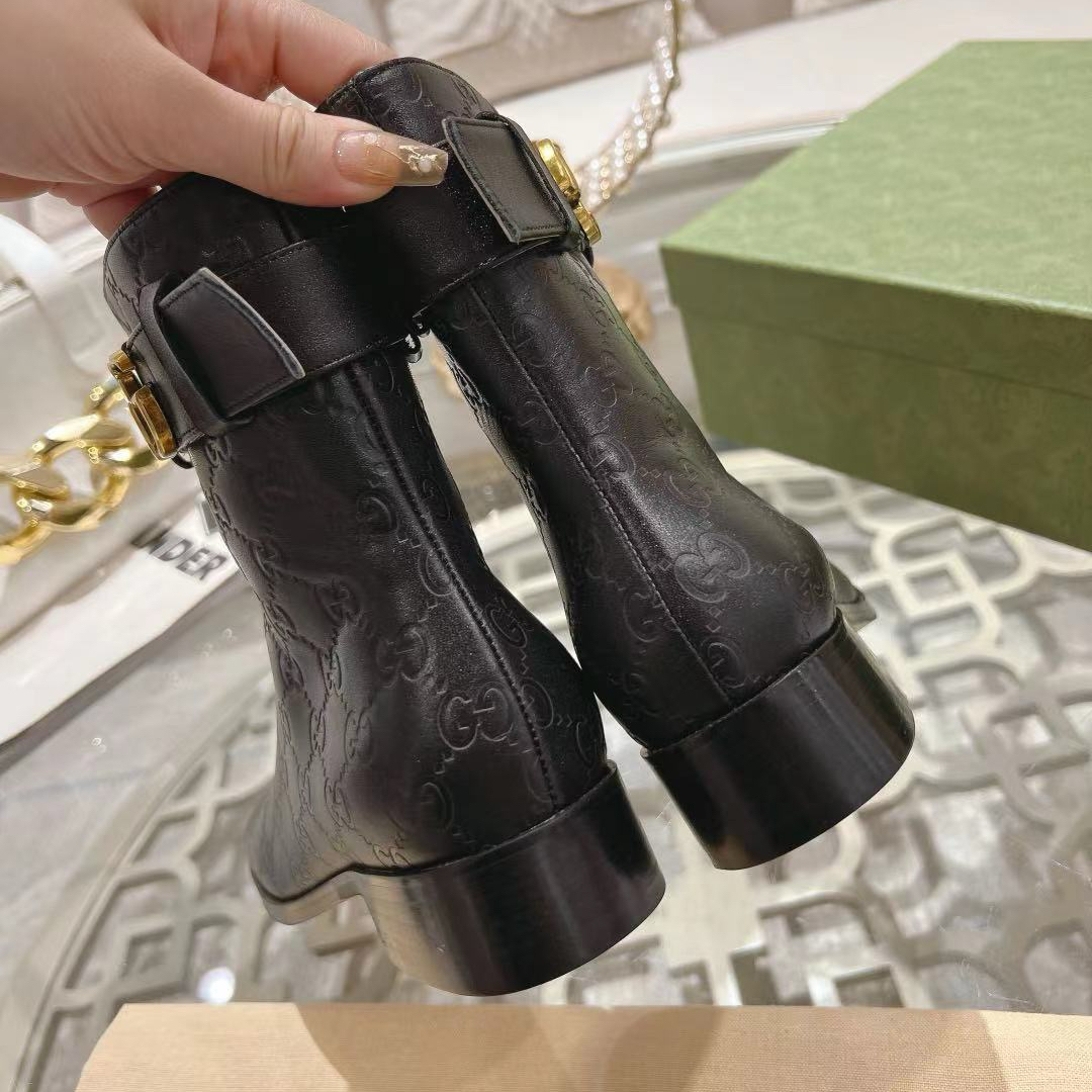 Gucci embossed boots - cnluxepick