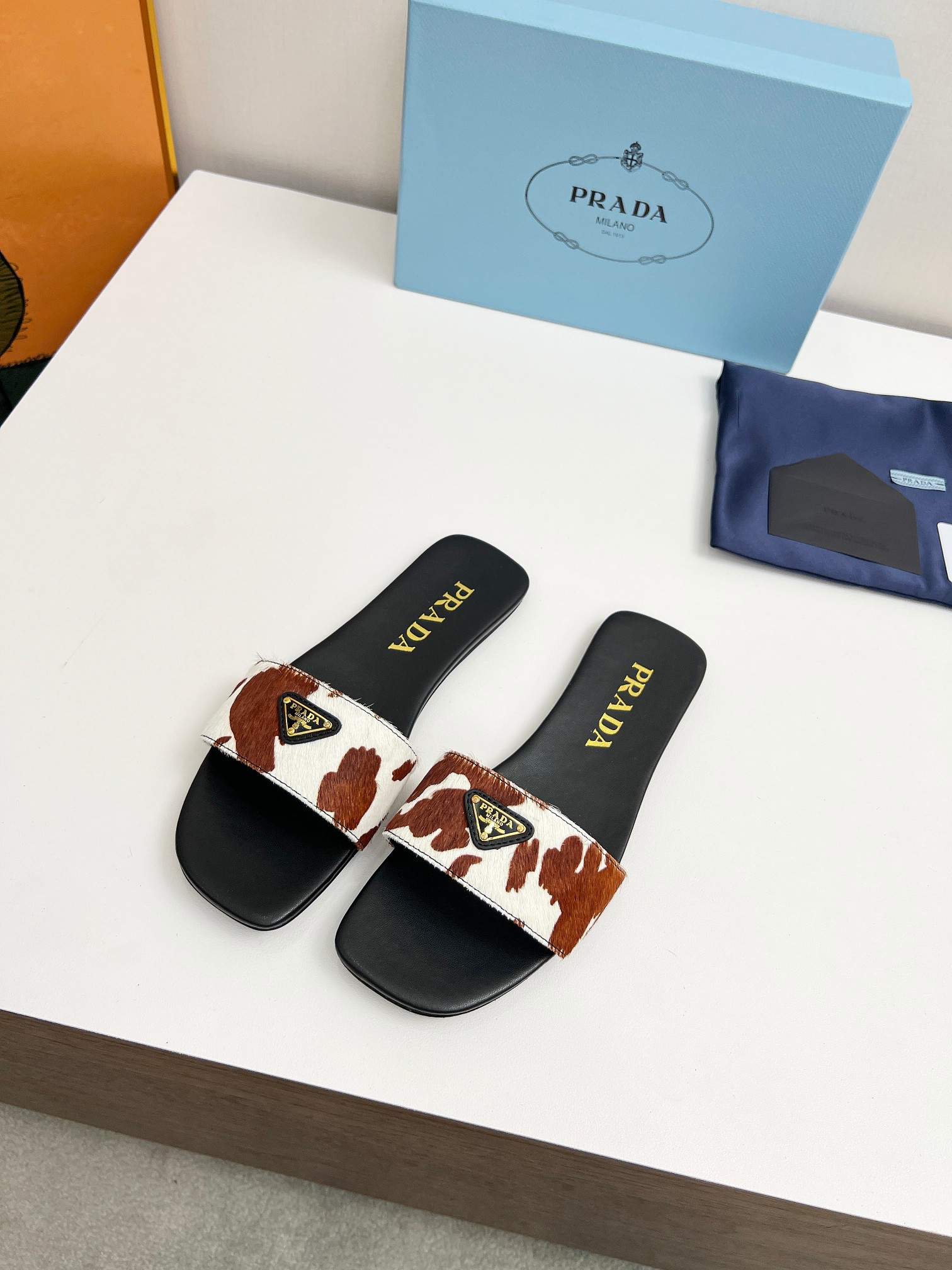 Prada triangle logo cow slides - cnluxepick