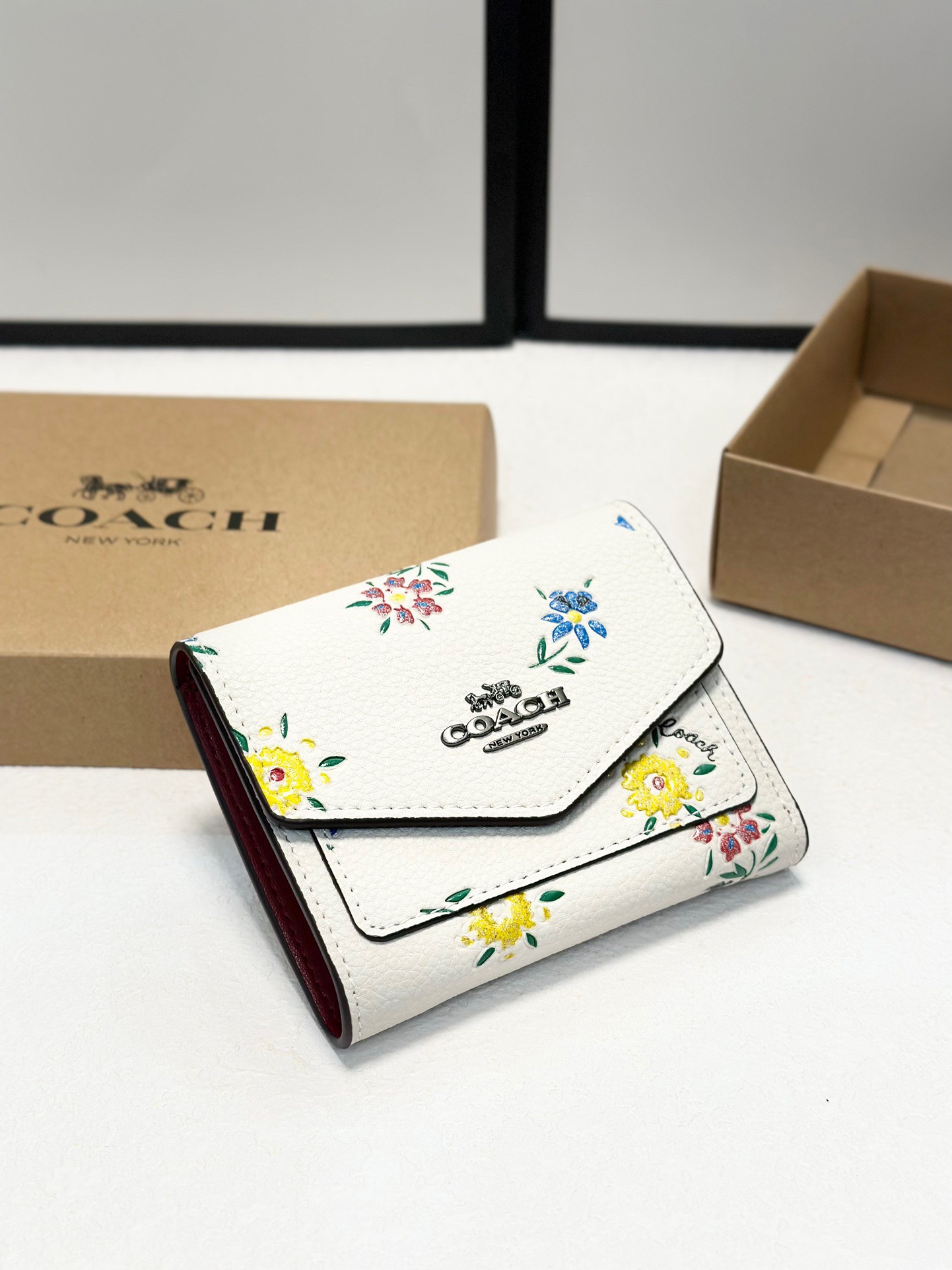 Coach printed tri-fold short wallet - cnluxepick