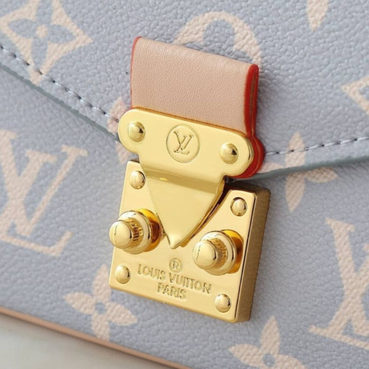 Louis Vuitton Pochette Métis East West Coated Canvas Trianon 8.5 Inches M12429