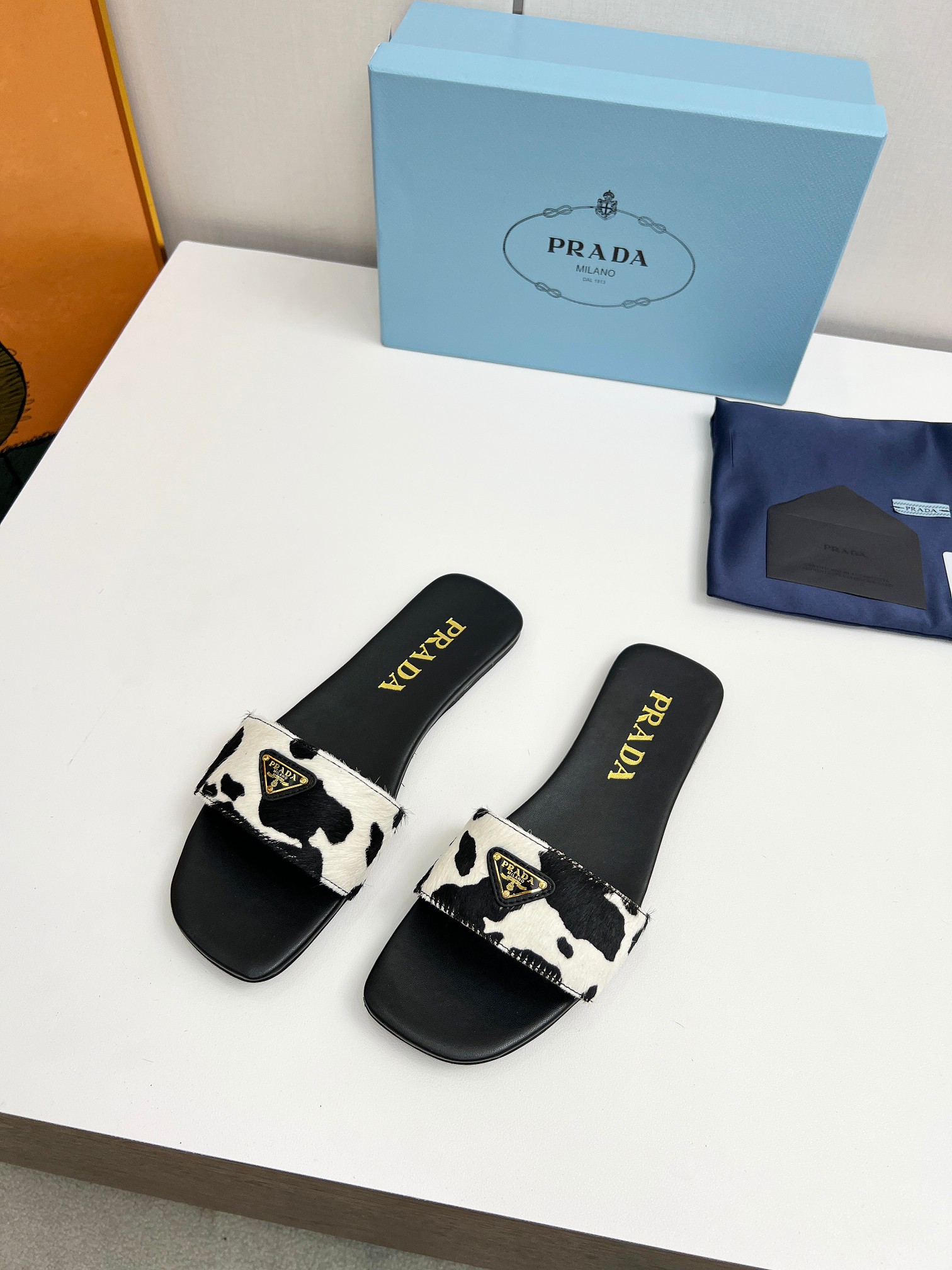 Prada triangle logo cow slides - cnluxepick