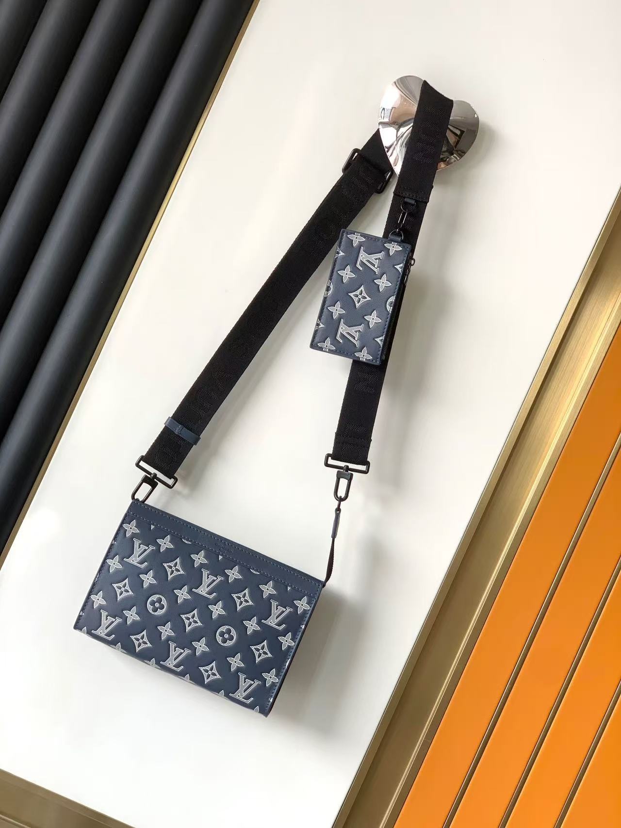 LV Pochette Voyage Embossed Flower Blue M83384