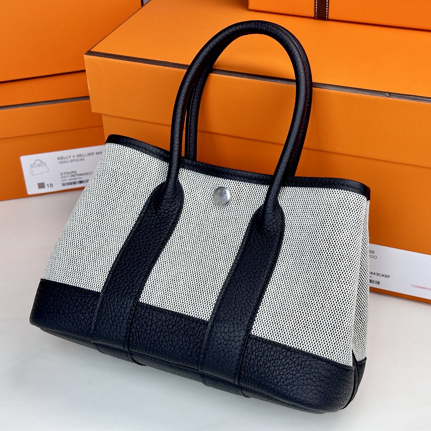 6050-Hermès Black & White Mesh Handbag | Classic Contrast with a Modern Twist