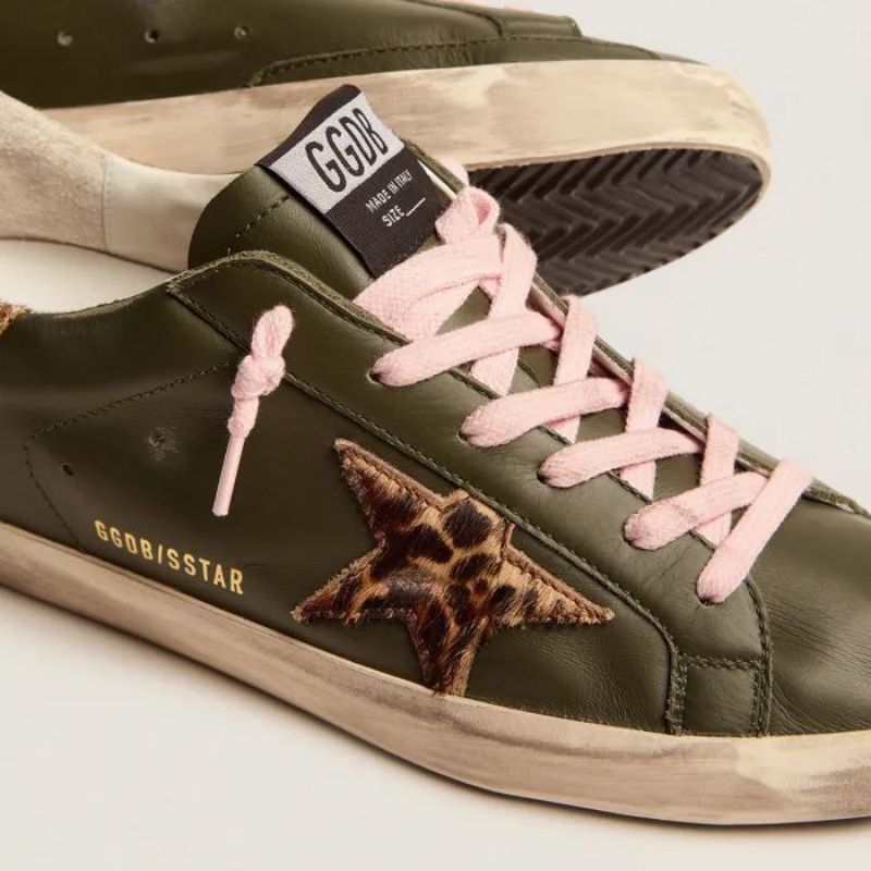 Golden Goose GGDB Super-Star sneakers in dark green leather with gold glitter heel tab