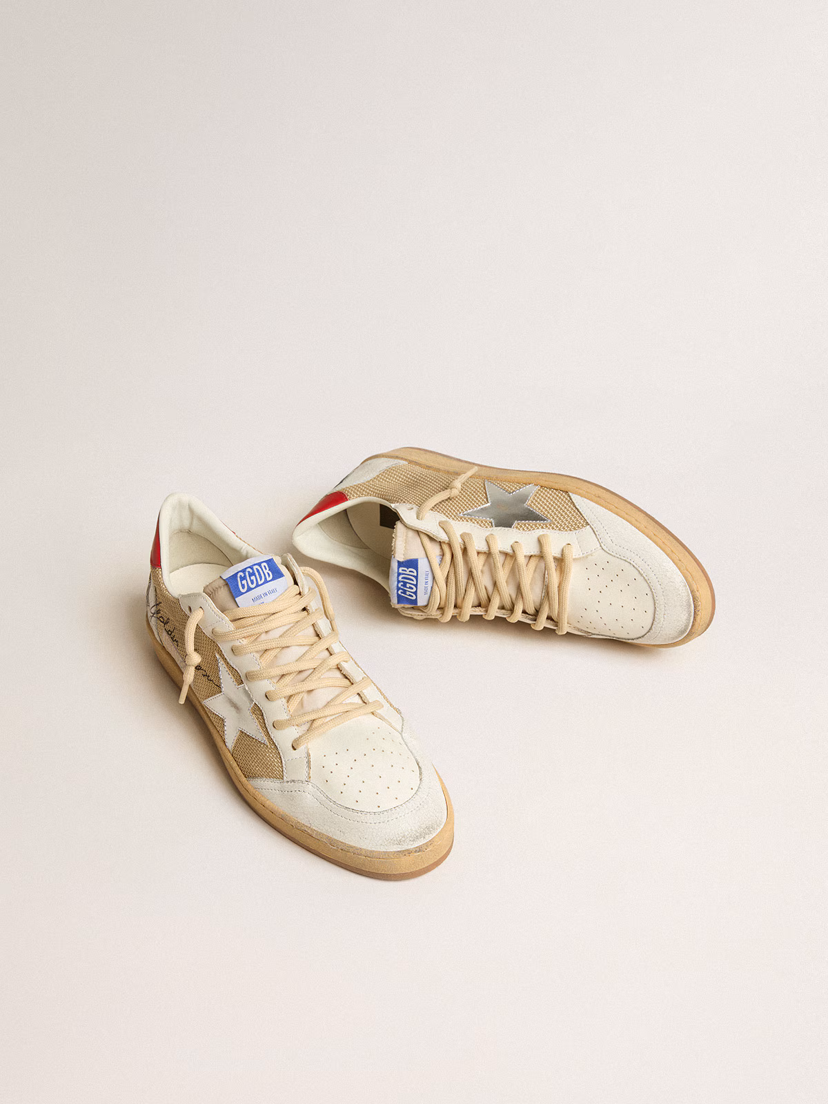Golden Goose GGDB Ball Star LTD in mesh with metallic leather star and red heel tab
