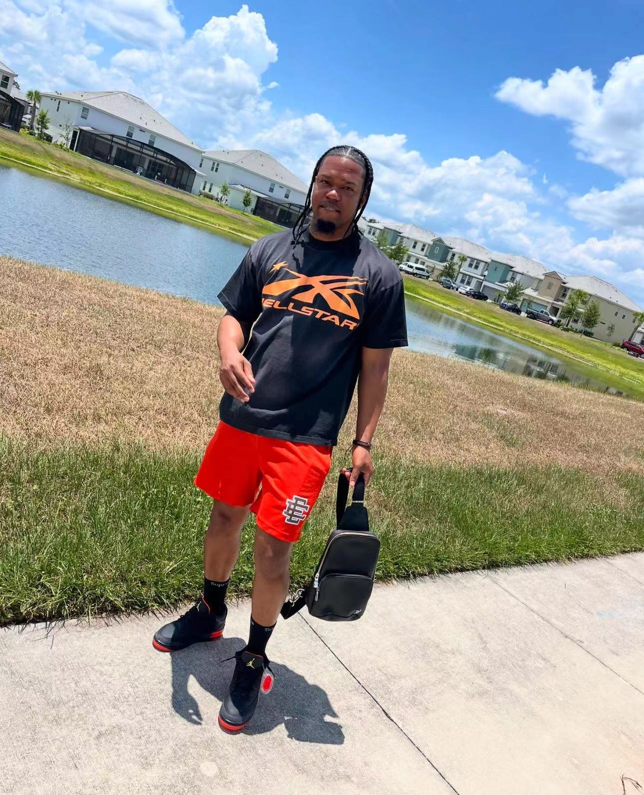 1:1 quality version Front and back full orange washed black tee with NFC tag