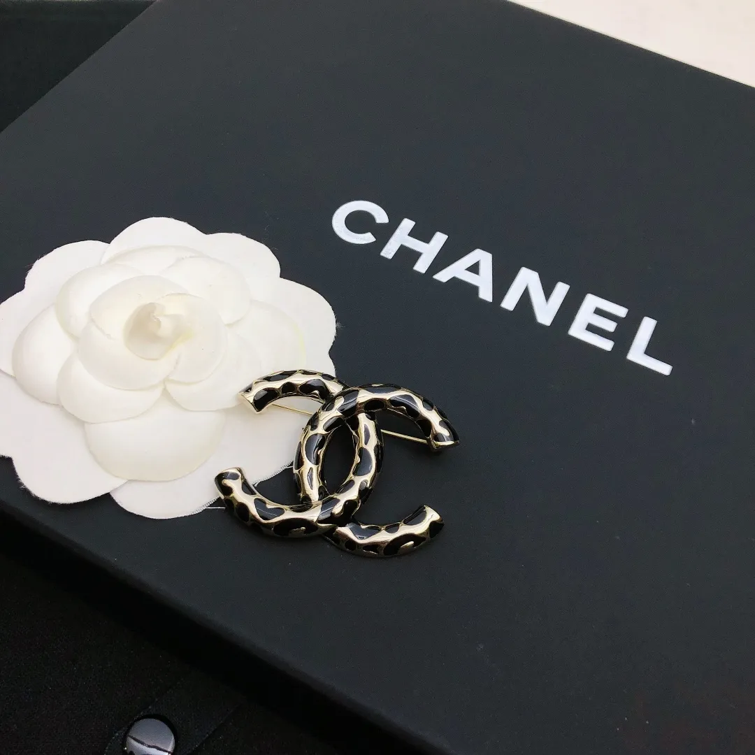 cc Brooch