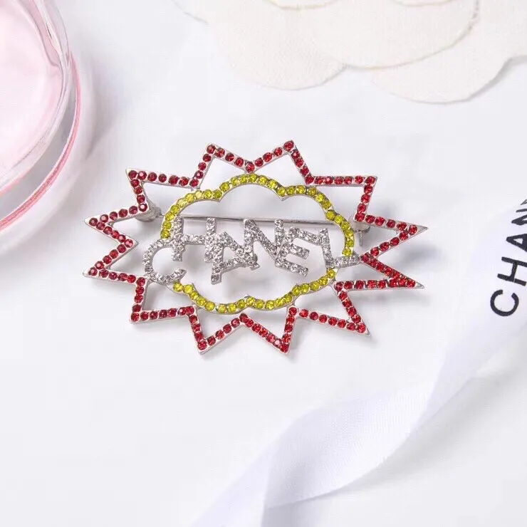 cc Brooch