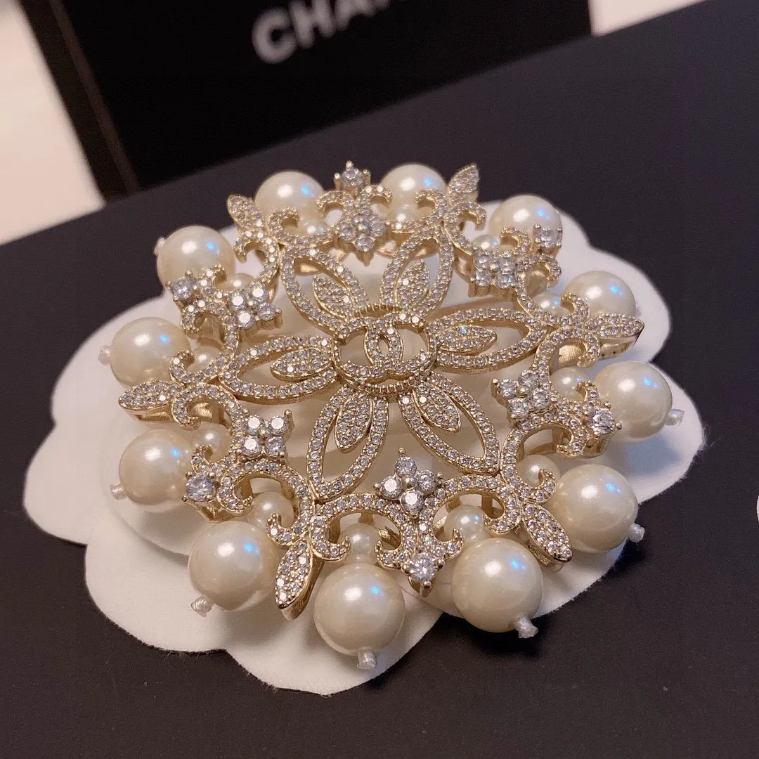 cc Brooch