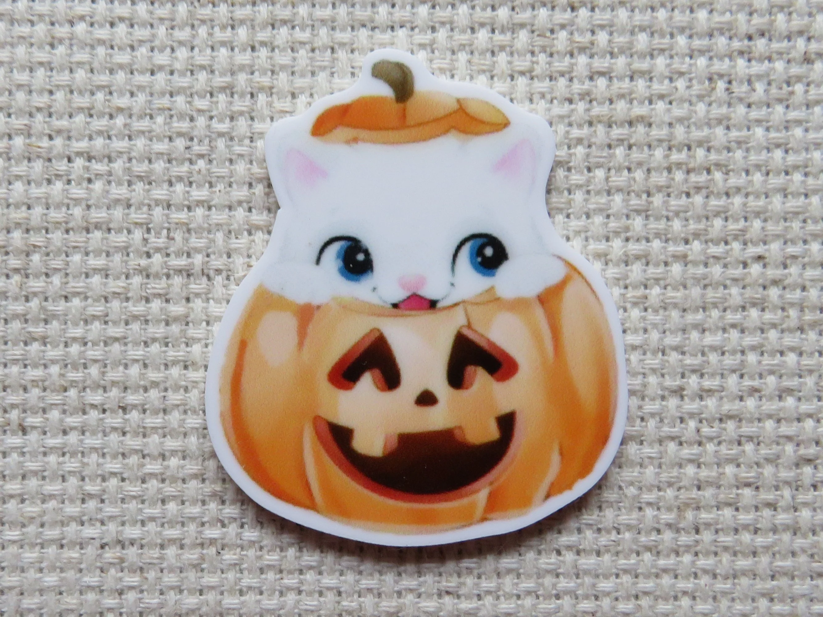 White Kitty Peeking Out of a Jack-O-Lantern Needle Minder, Cover Minder, Magnet