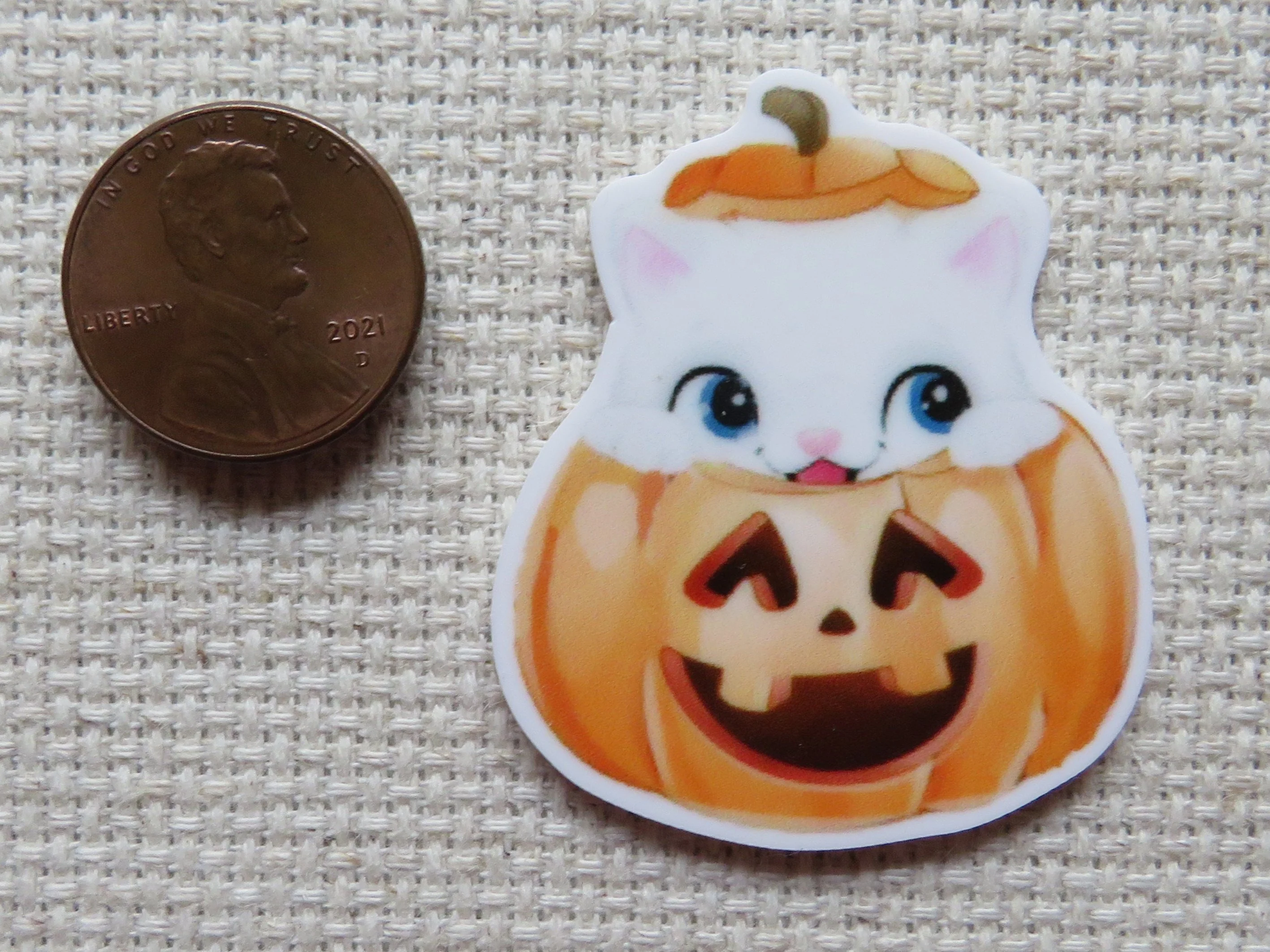 White Kitty Peeking Out of a Jack-O-Lantern Needle Minder, Cover Minder, Magnet