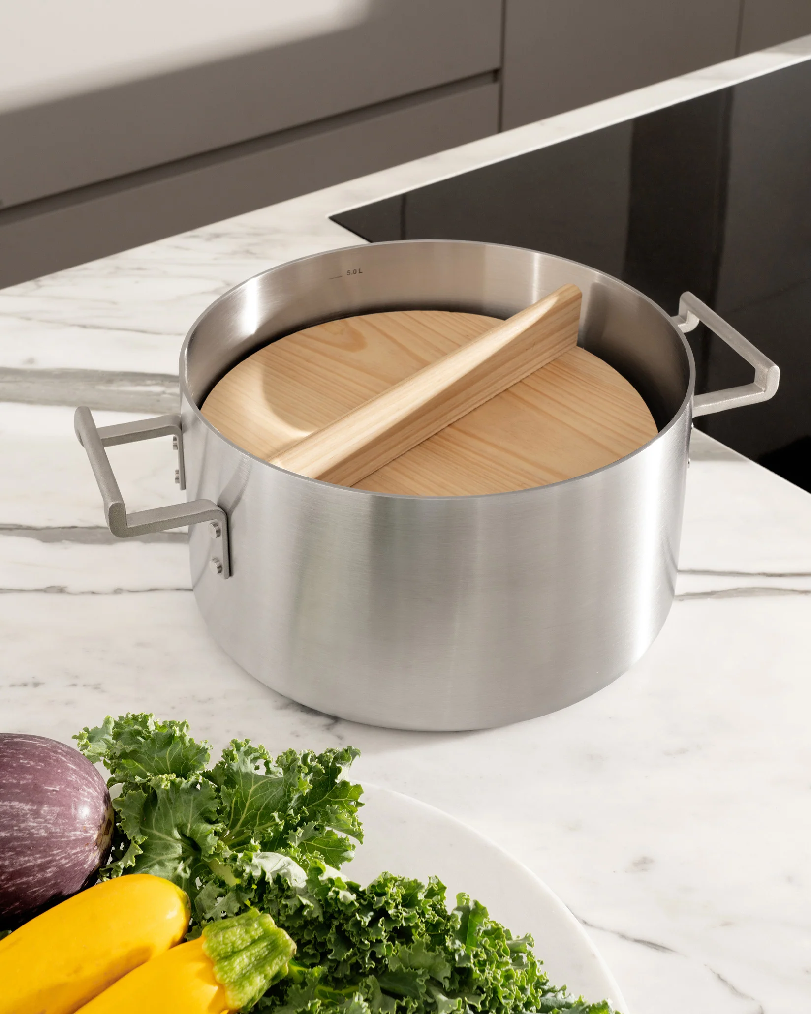 Convivio Unit in cypress wood for simmering delicate ingredients. Design David Chipperfield , Consultant Pietro Leemann