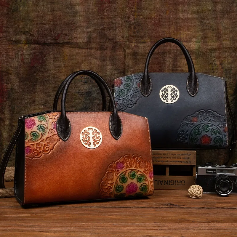 Classic Top-Handle Leather Bag with Ornate Brass Emblem