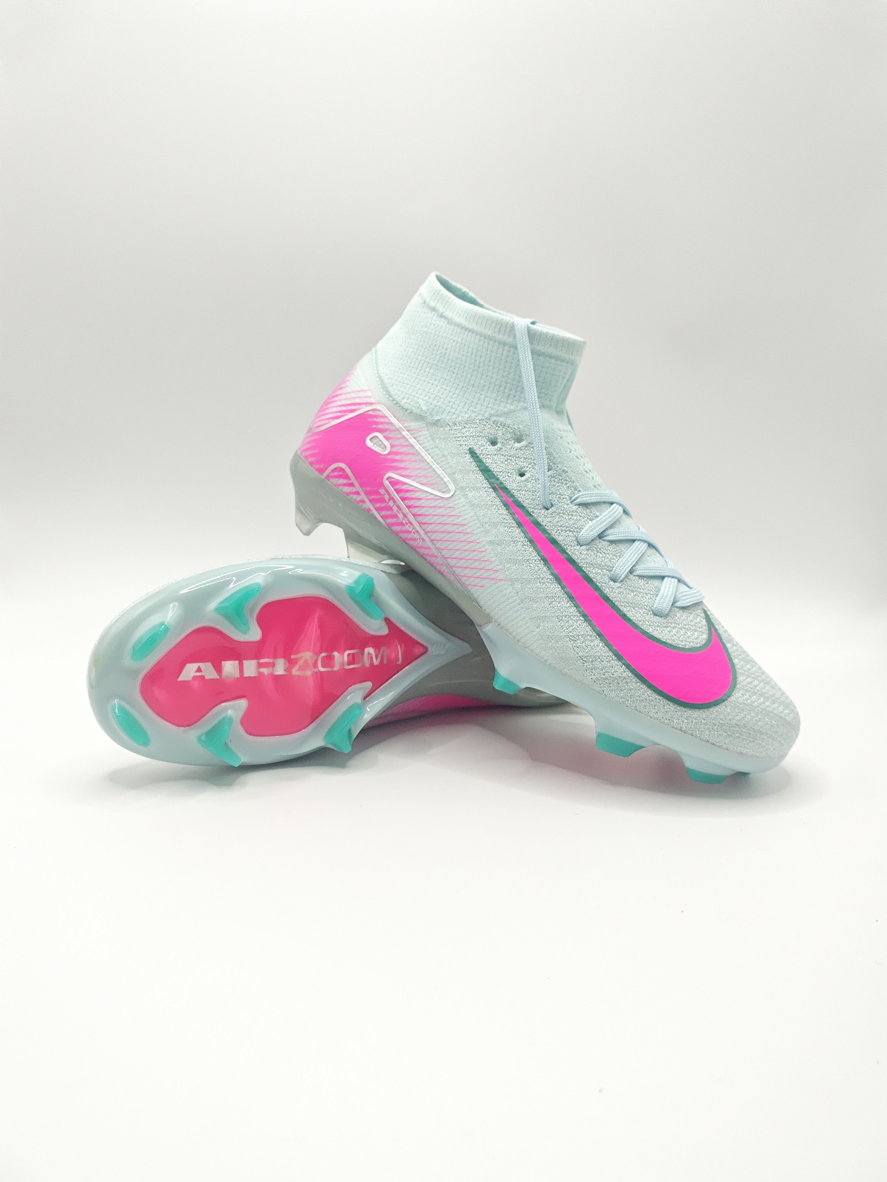 Nike Mercurial 16 FG Soccer Cleats with Built-in Bonded Pack: Full Air Cushion for All-Game Comfort, Waterproof Knit for Rainy Fields