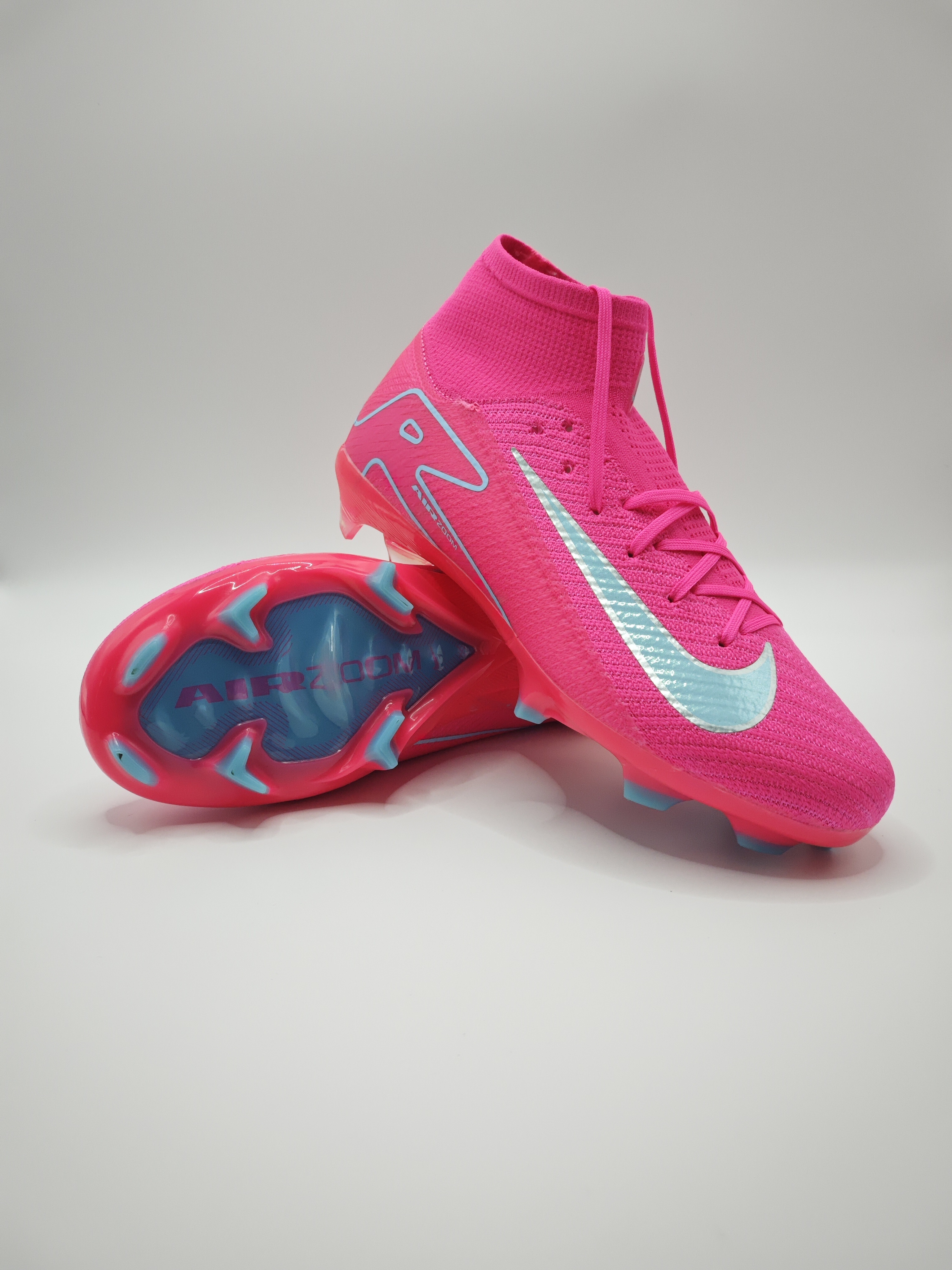 Nike Mercurial 16 FG Soccer Cleats with Built-in Bonded Pack: Full Air Cushion for All-Game Comfort, Waterproof Knit for Rainy Fields