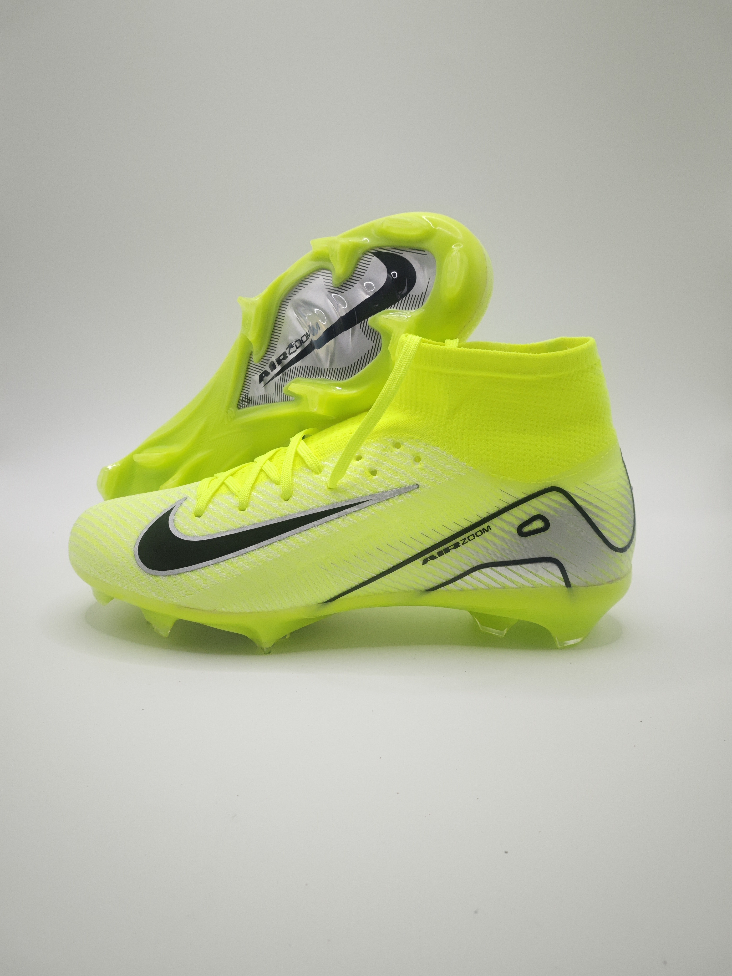 Nike Mercurial 16 FG Soccer Cleats with Built-in Bonded Pack: Full Air Cushion for All-Match Comfort, Waterproof Knit for Wet Pitches