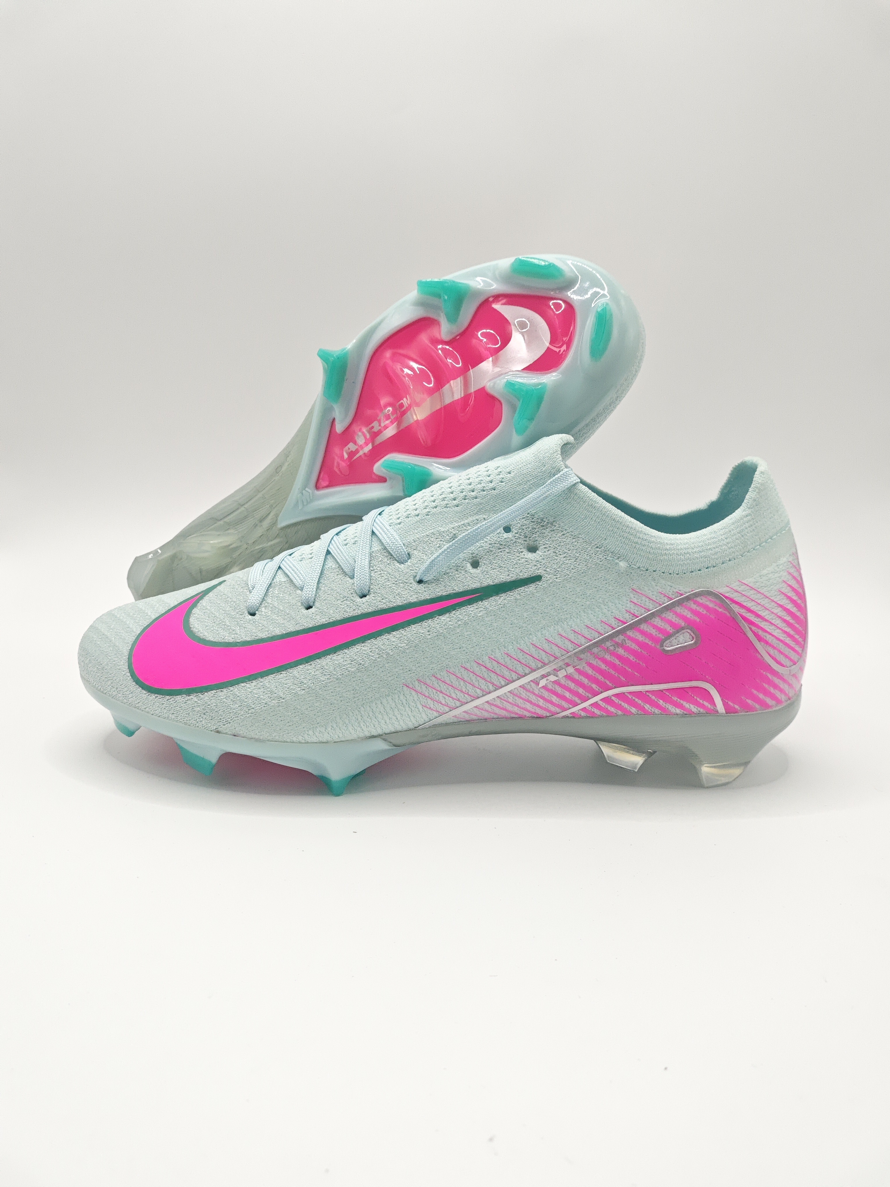 Nike Mercurial 16 FG Soccer Cleats with Built-in Bonded Pack: Full Air Cushion for All-Game Comfort, Waterproof Knit for Rainy Fields