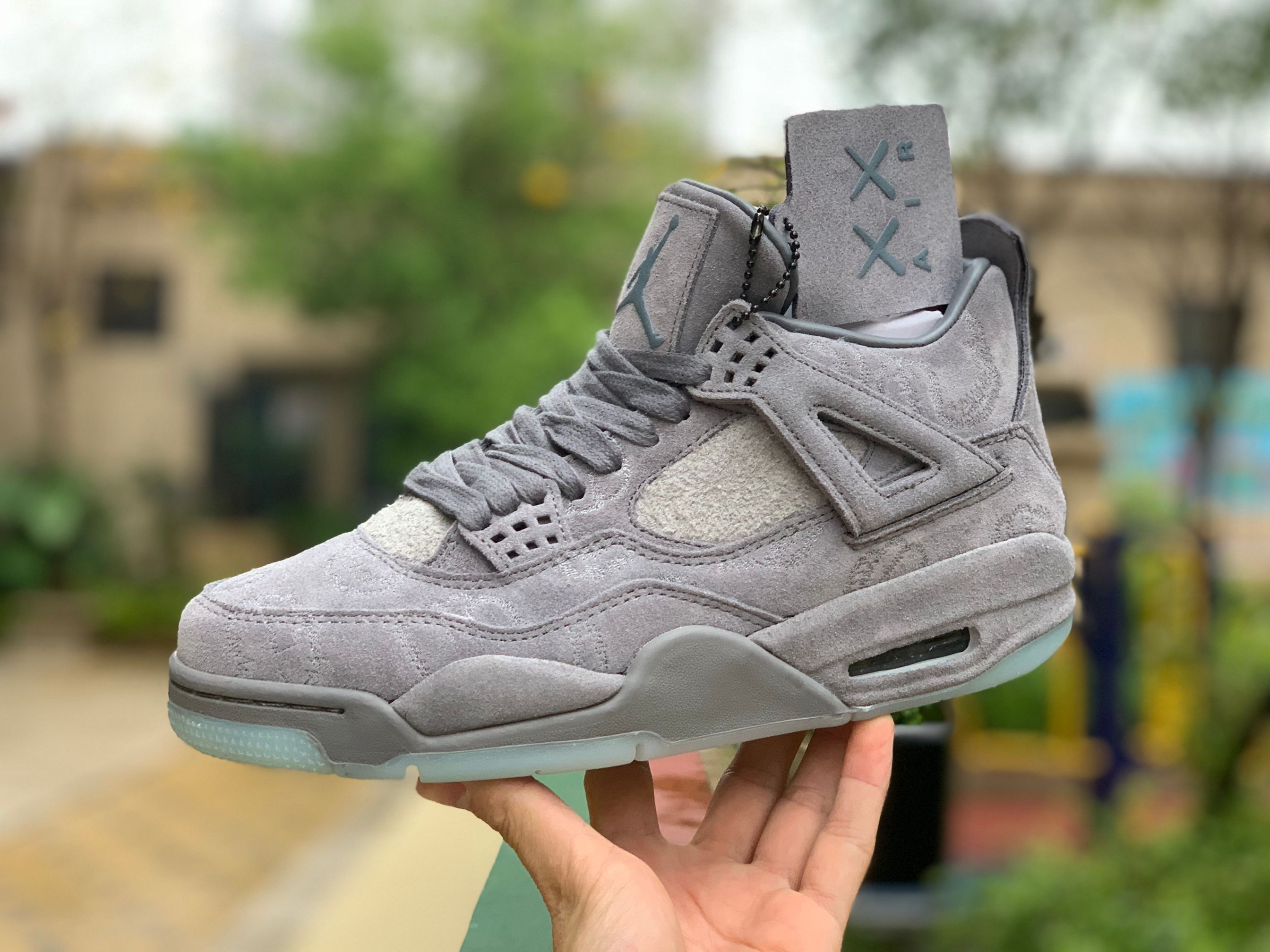Kaws x Air Jordan 4 “Cool Grey”