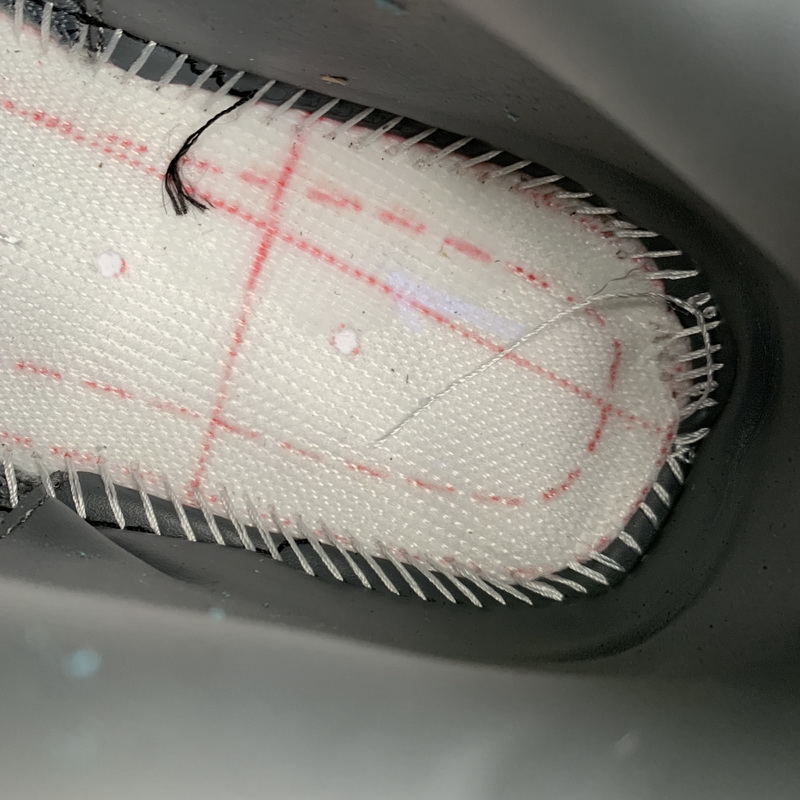 Kaws x Air Jordan 4 “Cool Grey”