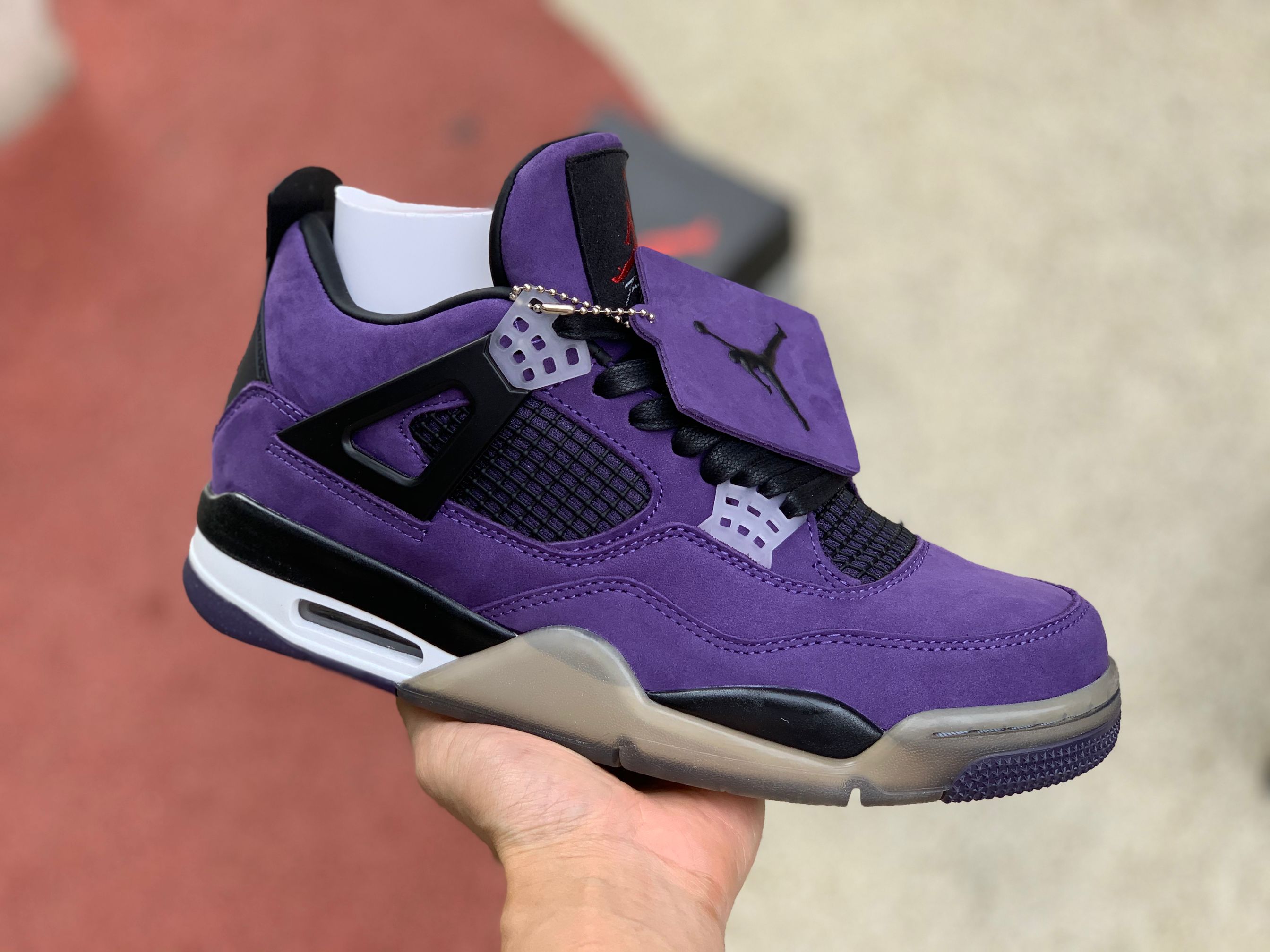 Travis Scott x Air Jordan 4 Purple