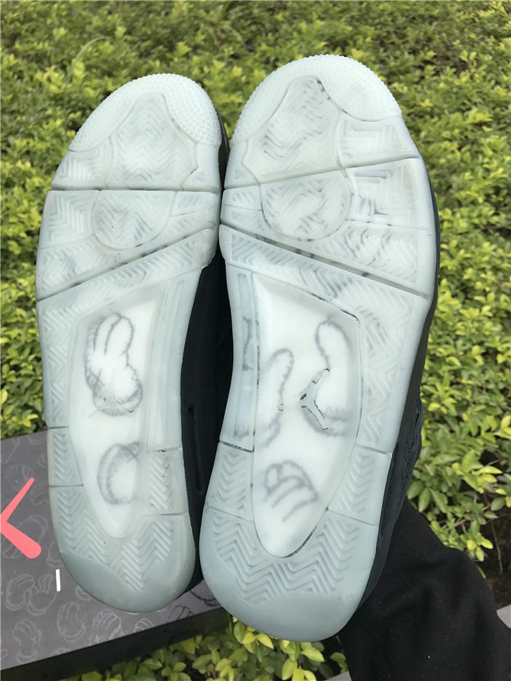 KAWS x Air Jordan 4 Black