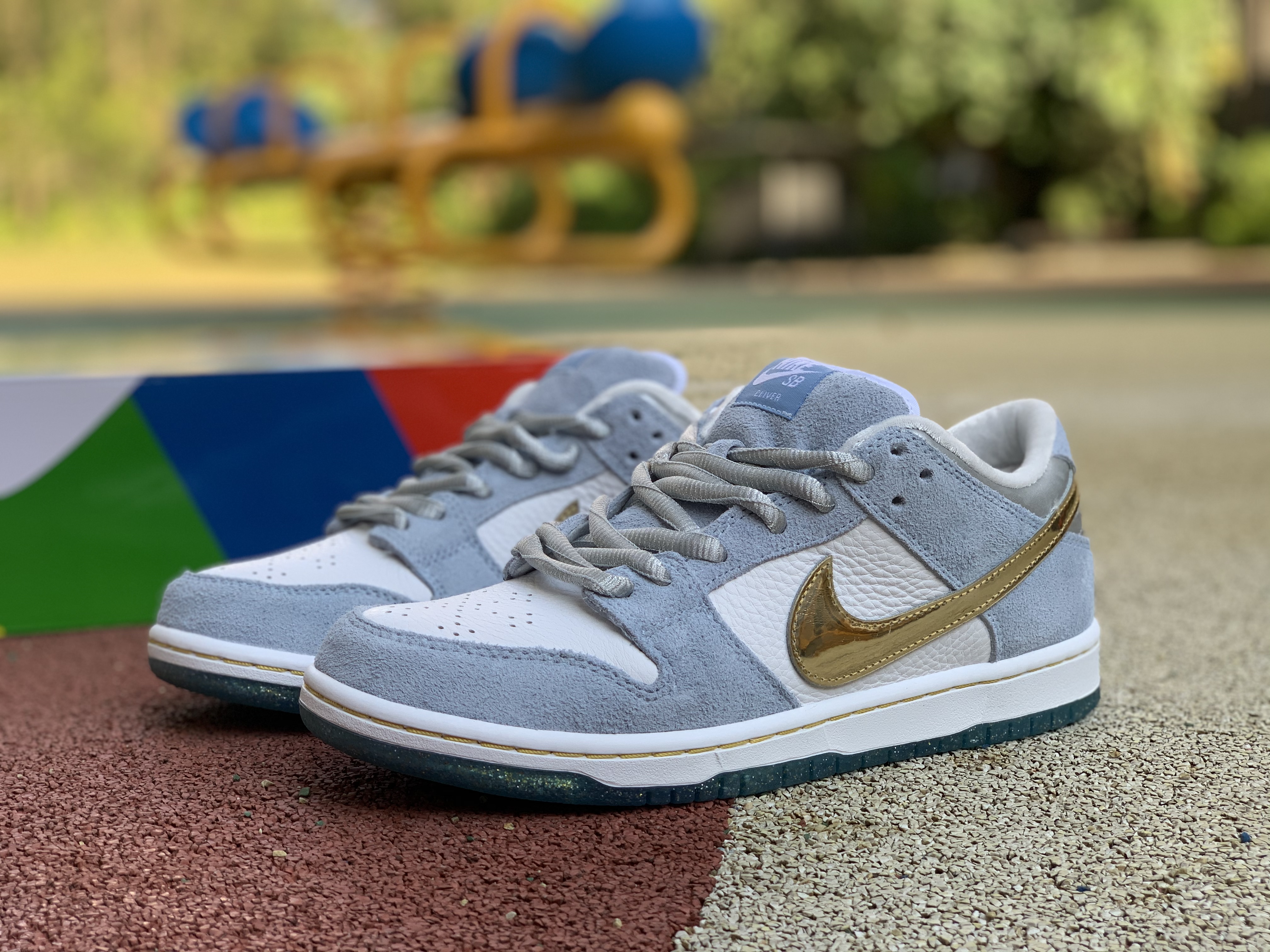Sean Cliver x Nike SB Dunk Low