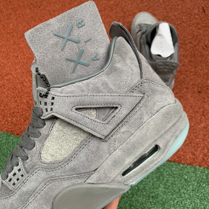 Kaws x Air Jordan 4 “Cool Grey”