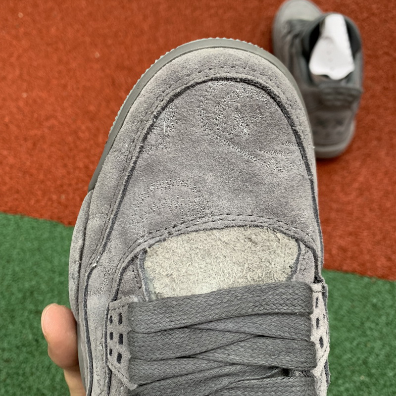 Kaws x Air Jordan 4 “Cool Grey”