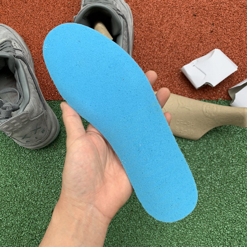 Kaws x Air Jordan 4 “Cool Grey”