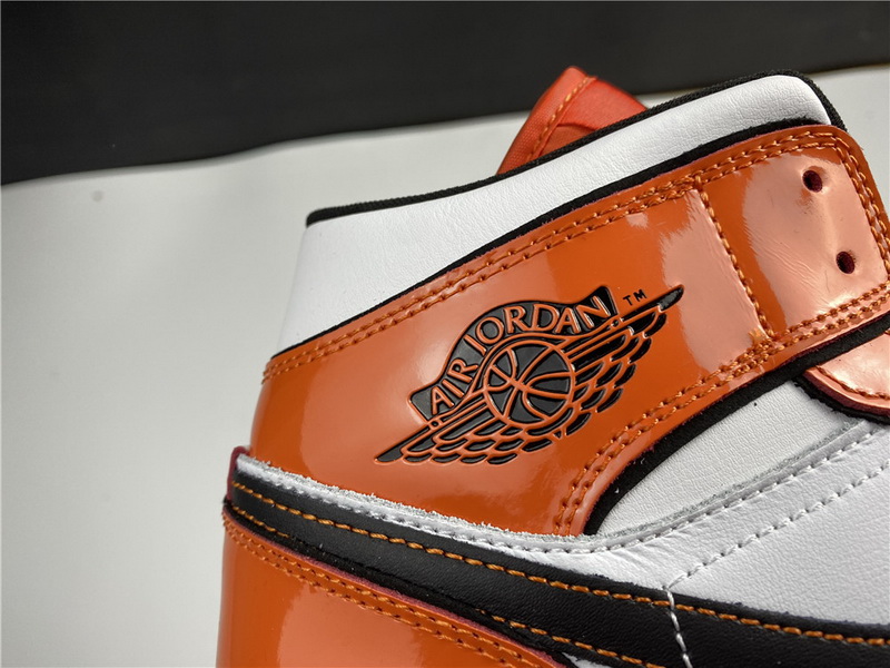 Air Jordan 1 Mid “Turf Orange”