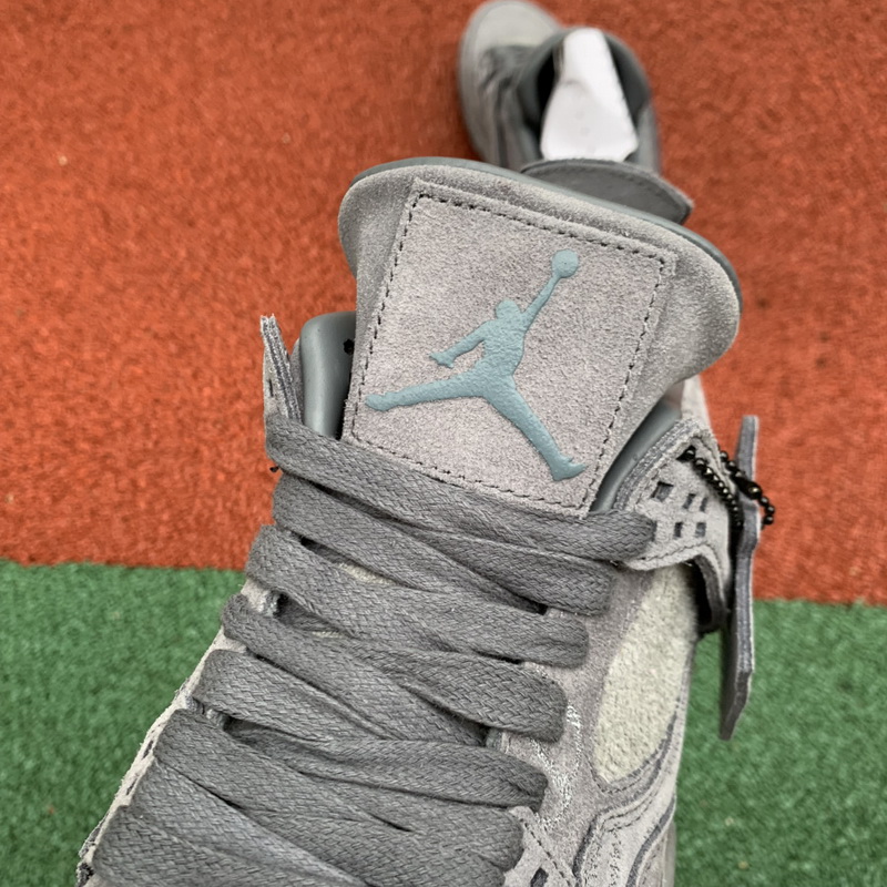 Kaws x Air Jordan 4 “Cool Grey”