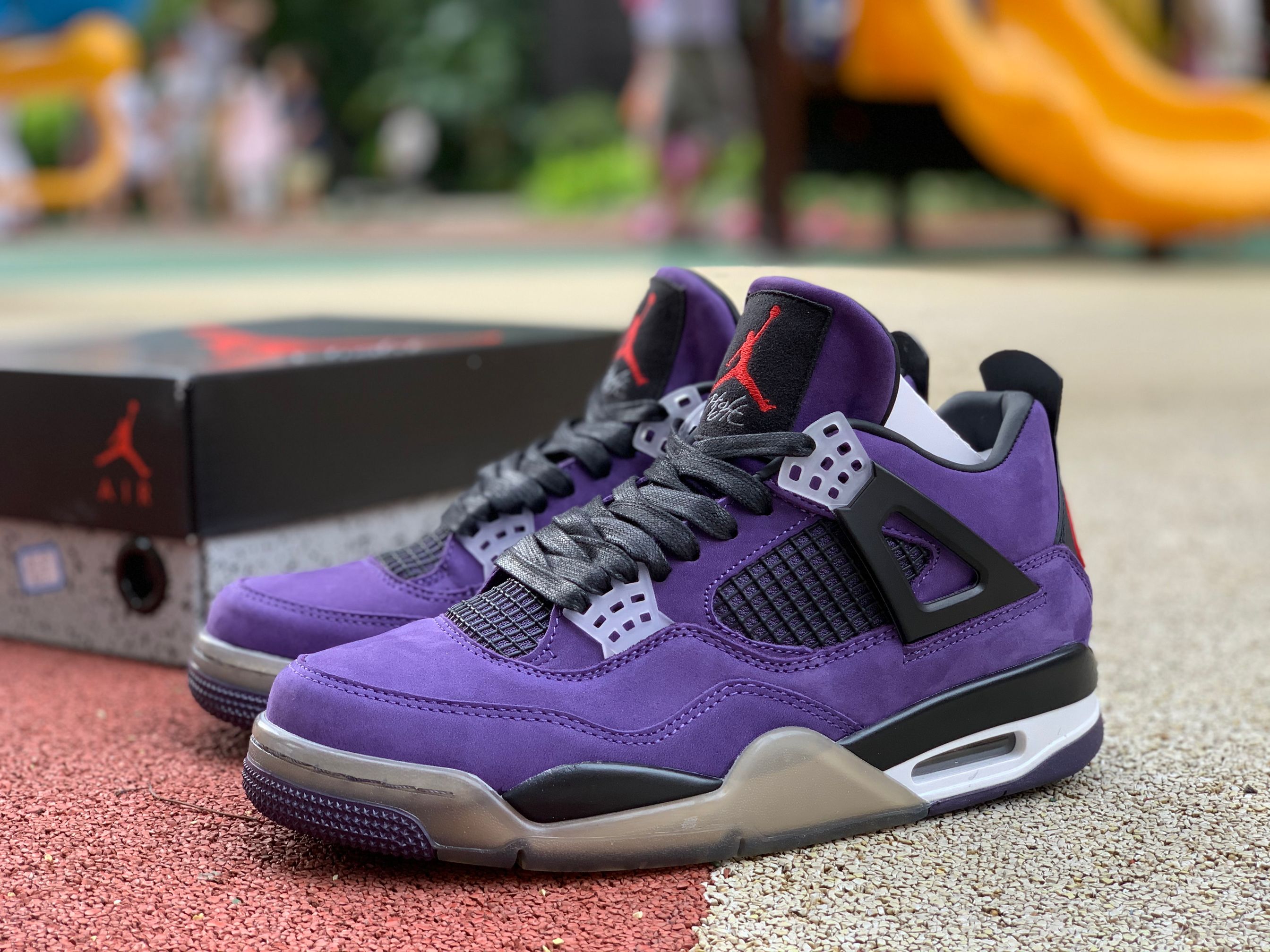 Travis Scott x Air Jordan 4 Purple