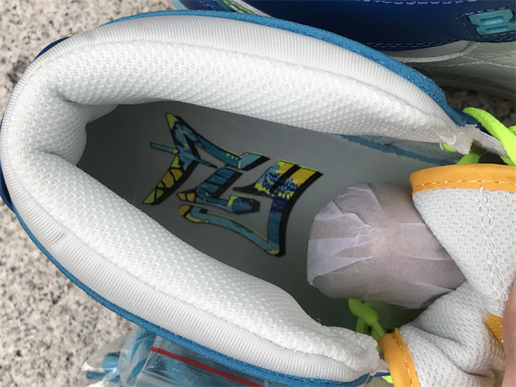 Air Jordan Legacy 312 Mandarin Duck in Ice blue