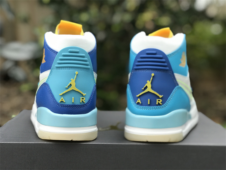 Air Jordan Legacy 312 Mandarin Duck in Ice blue