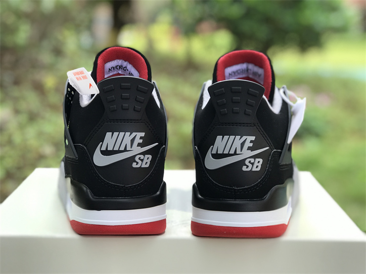 Nike SB x Air Jordan 4 in black and red