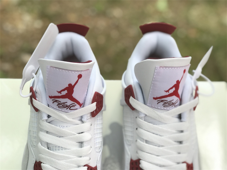 Air Jordan 4 in white and red
