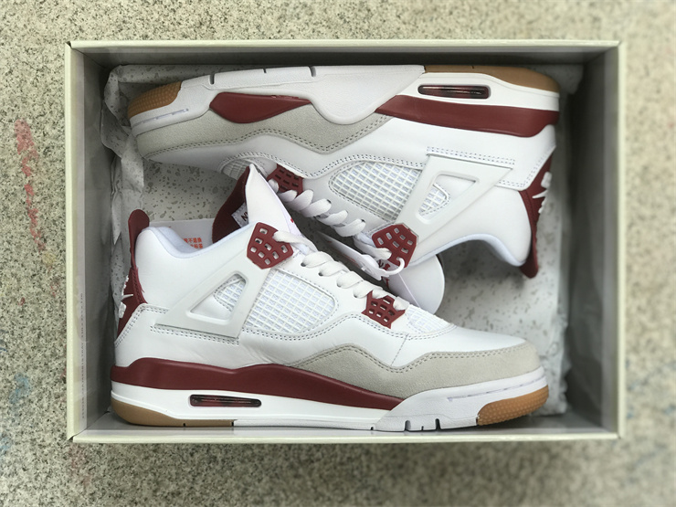 Air Jordan 4 in white and red