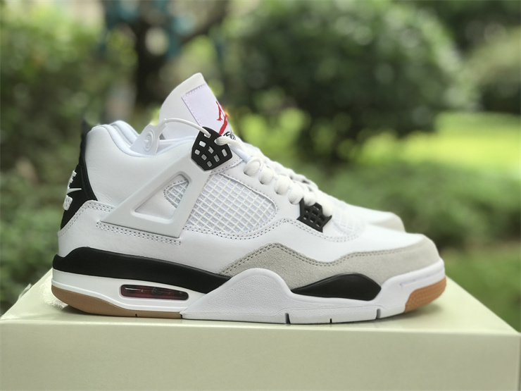 Air Jordan 4 in white and black