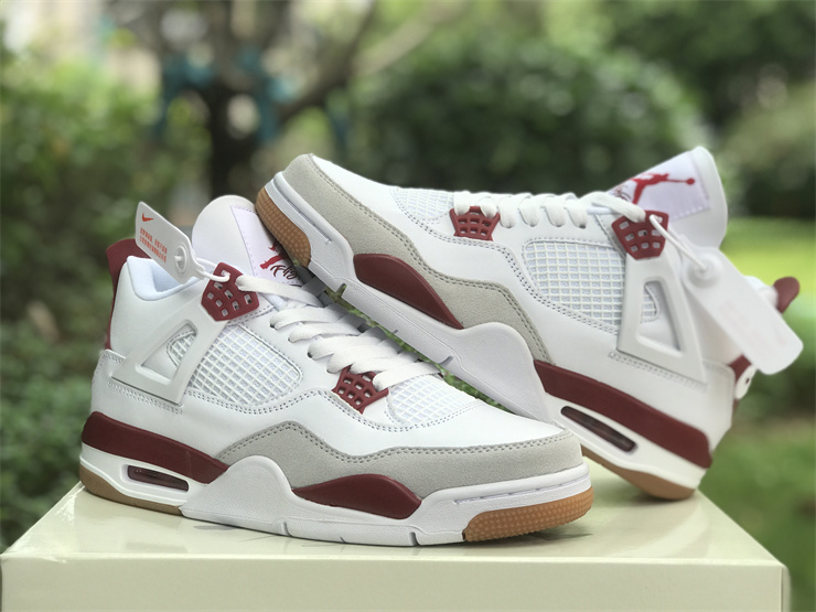 Air Jordan 4 in white and red