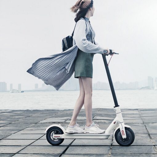 Xiaomi Mi Electric Scooter, 18.6 Miles Long-range Battery, Up to 15.5 MPH, Easy Fold-n-Carry Design, Ultra-Lightweight Adult Electric Scooter