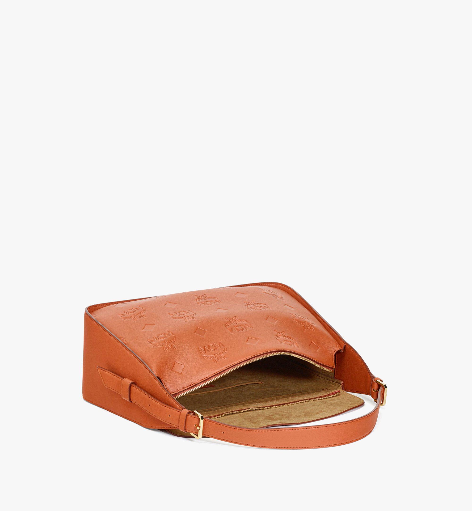 AREN FLAP HOBO IN EMBOSSED MONOGRAM LEATHER