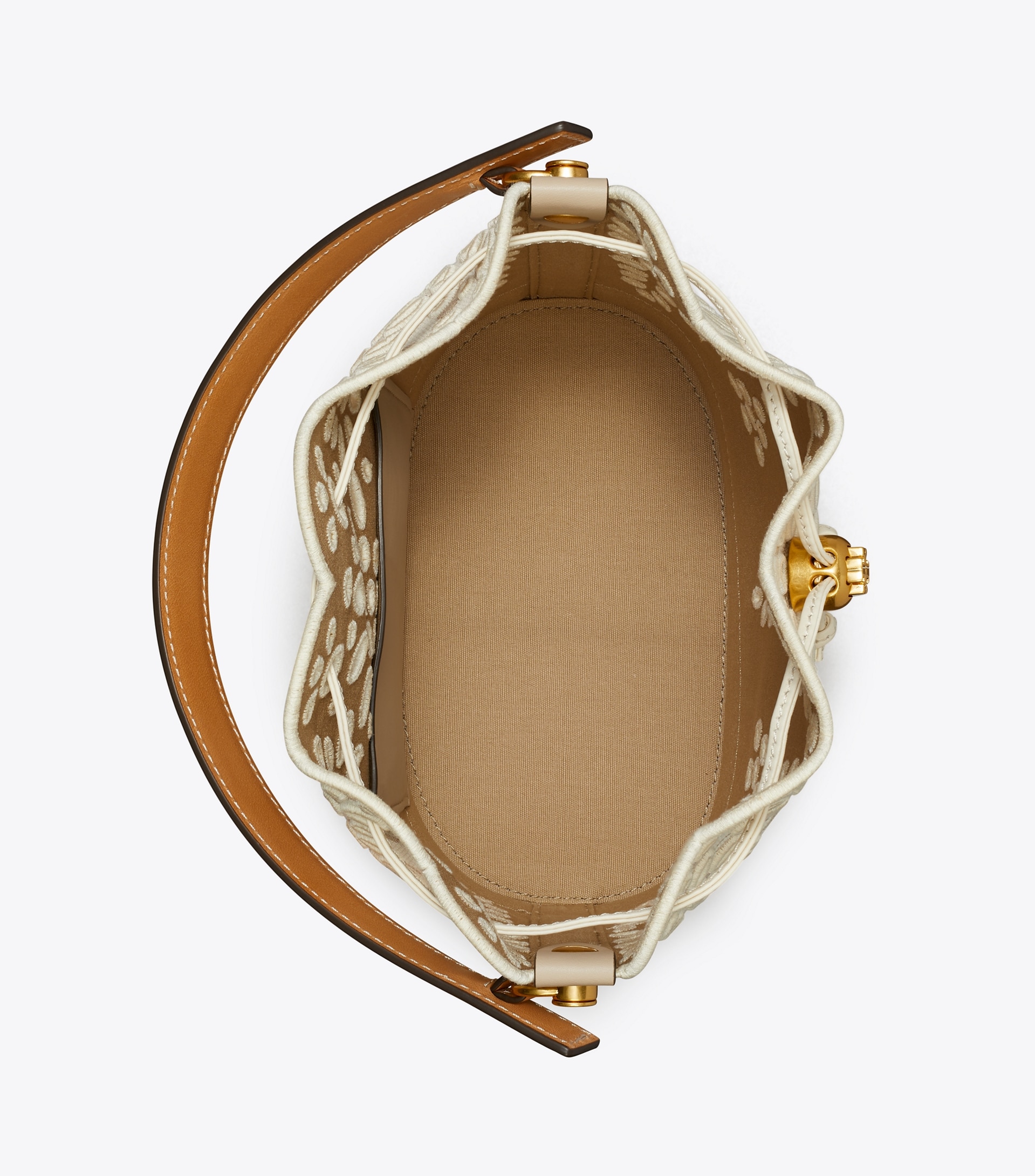 T MONOGRAM EYELET BUCKET BAG