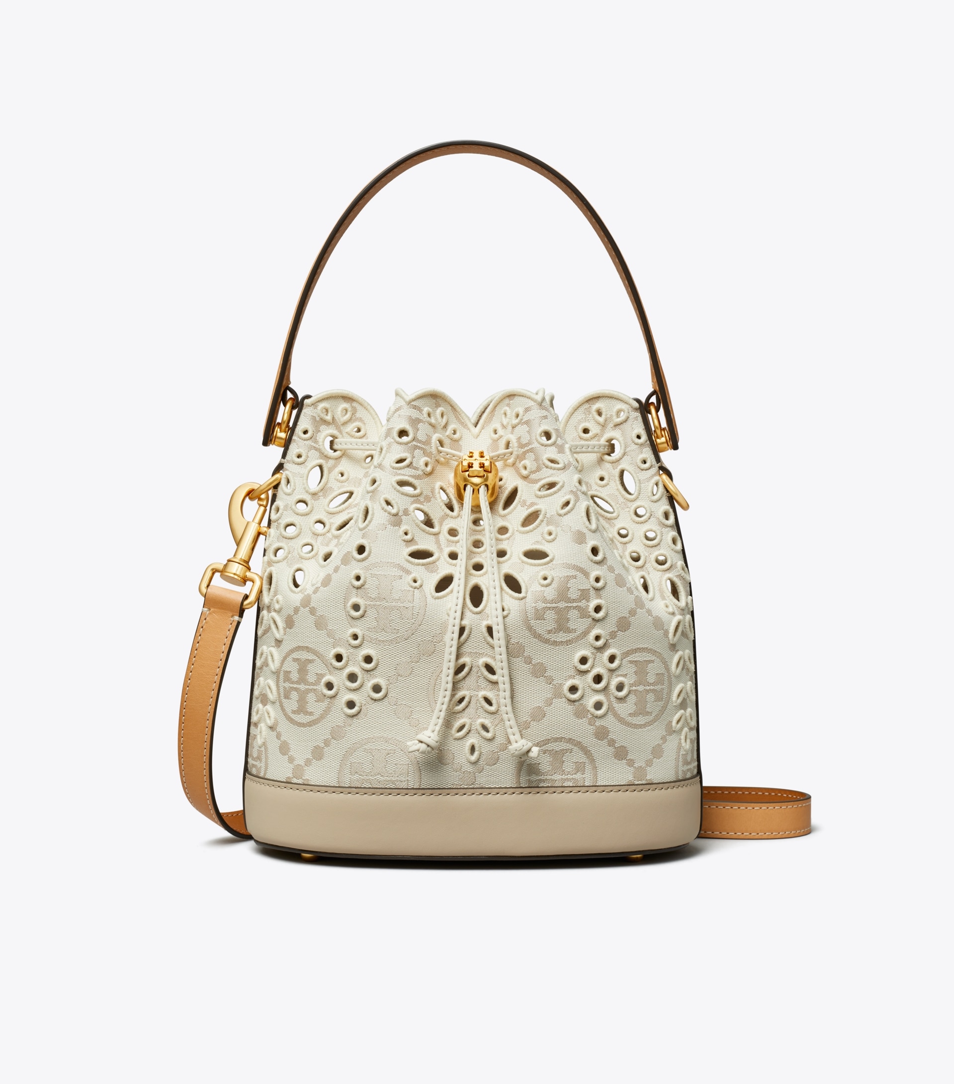 T MONOGRAM EYELET BUCKET BAG