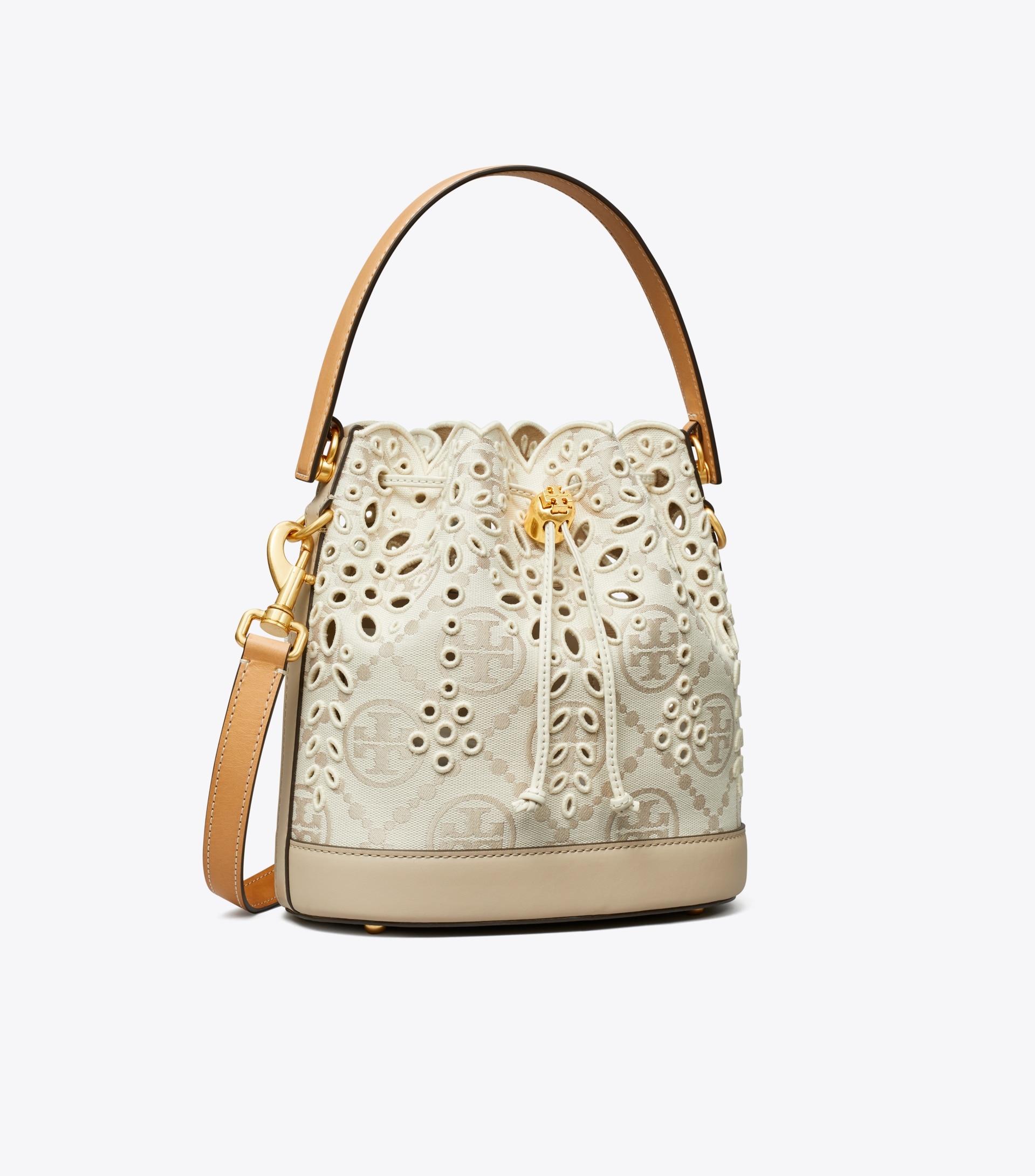 T MONOGRAM EYELET BUCKET BAG