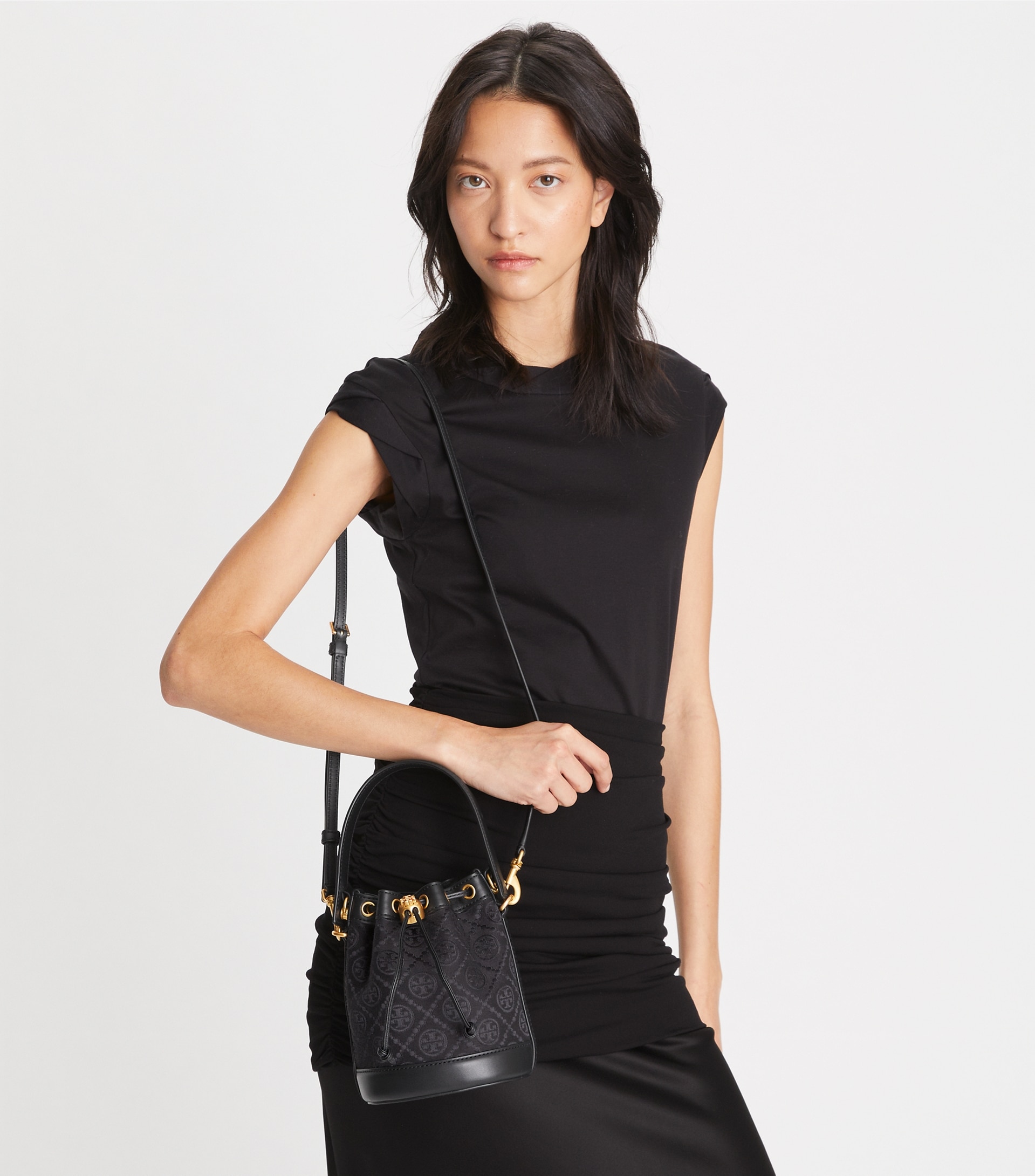 MINI T MONOGRAM BUCKET BAG