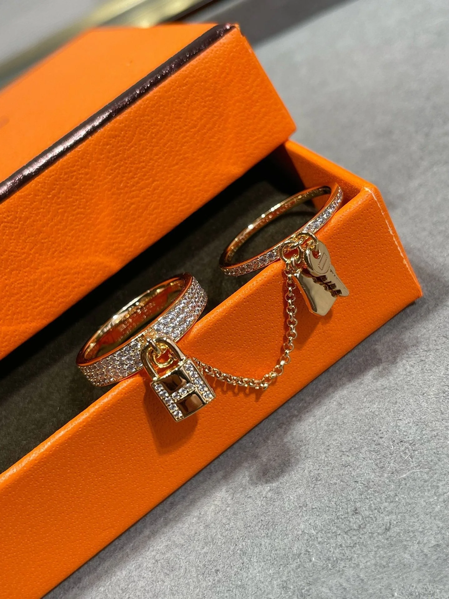 [Hermes]HM KELLY CLOCHETTE DOUBLE RING IN ROSE GOLD WITH DIAMONDS