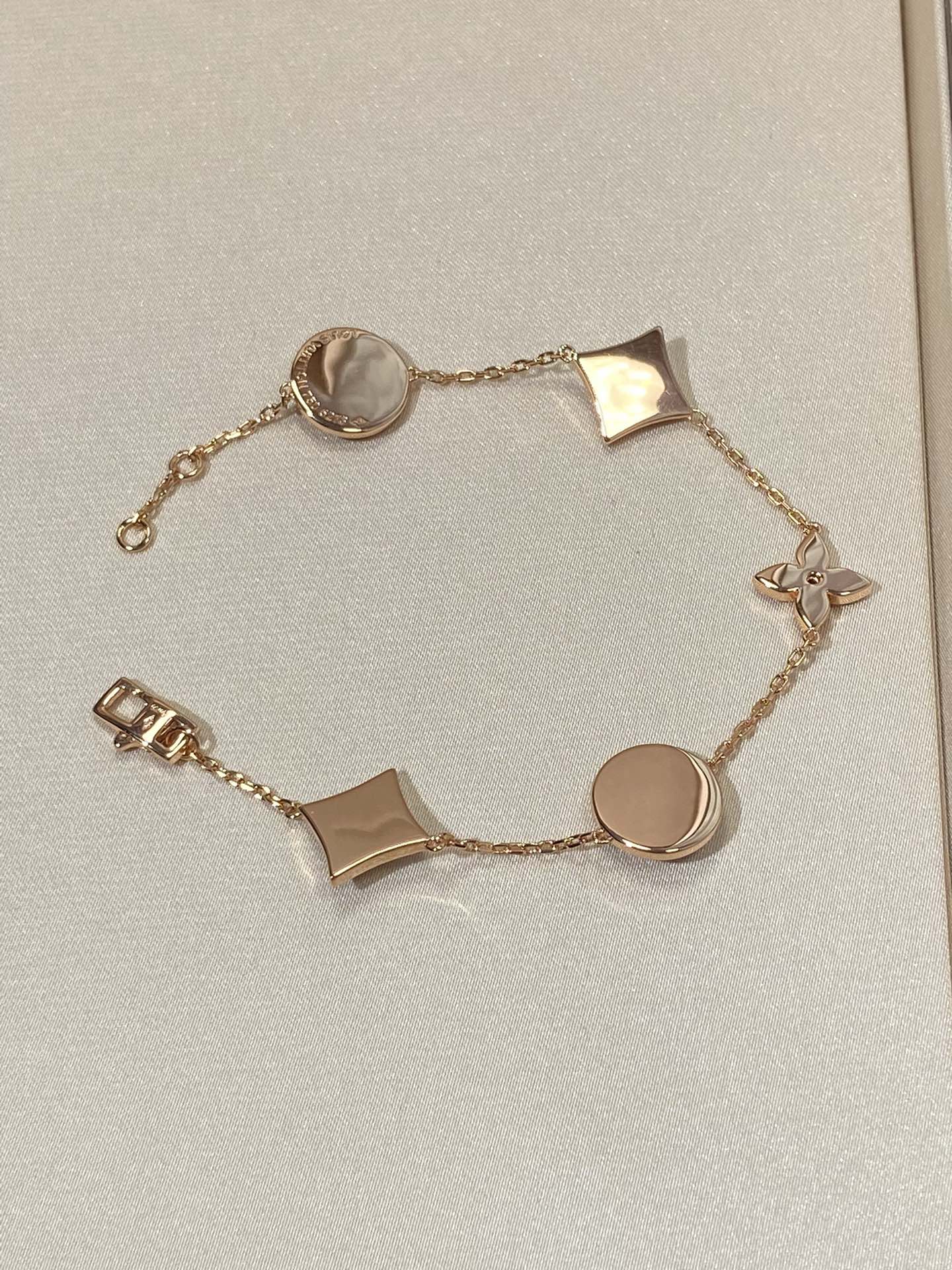 [Louis vuitton]STAR AND SUN 5 MOTIF MOP PINK GOLD BRACELET