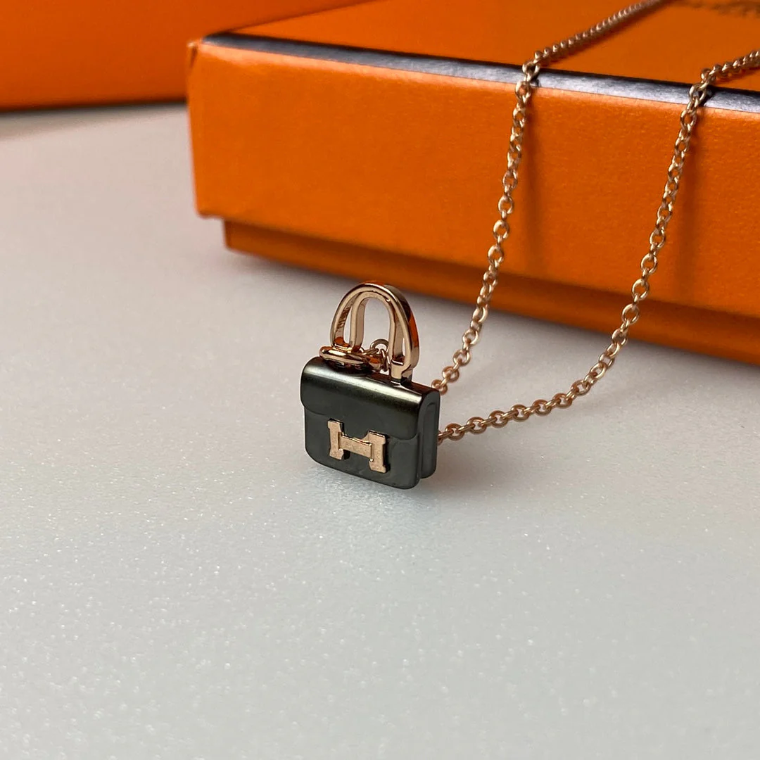 [Hermes]CONSTANCE BLACK PEDANT PINK GOLD NECKLACE