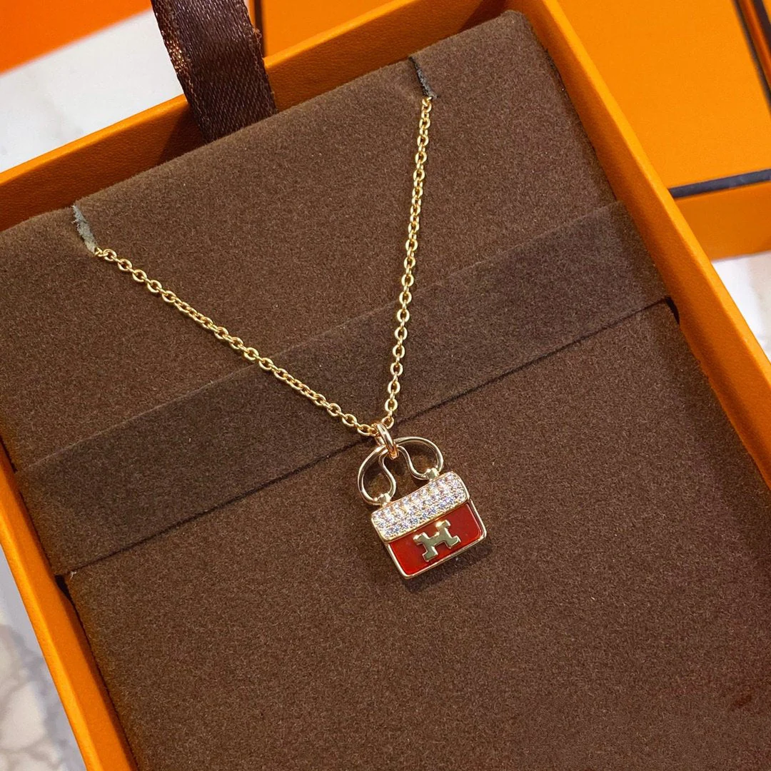 [Hermes]CONSTANCE RED PEDANT PINK GOLD NECKLACE