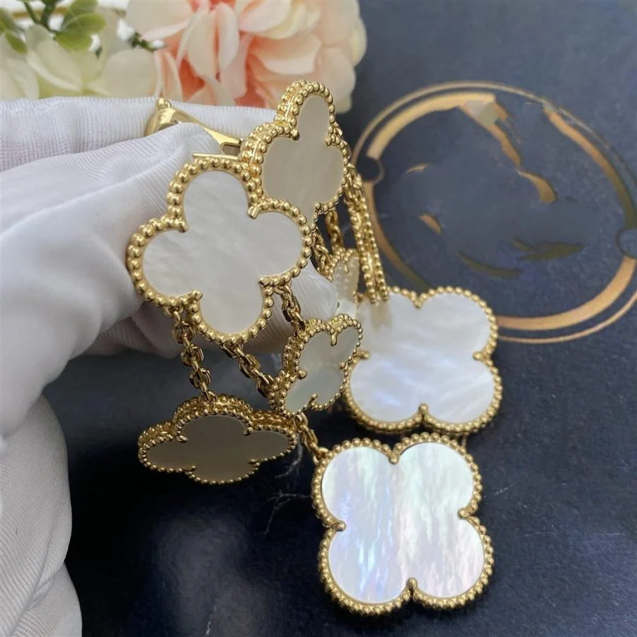[Van Cleef & Arpels] EARRINGS WHITE MOP 4 MOTIFS GOLD